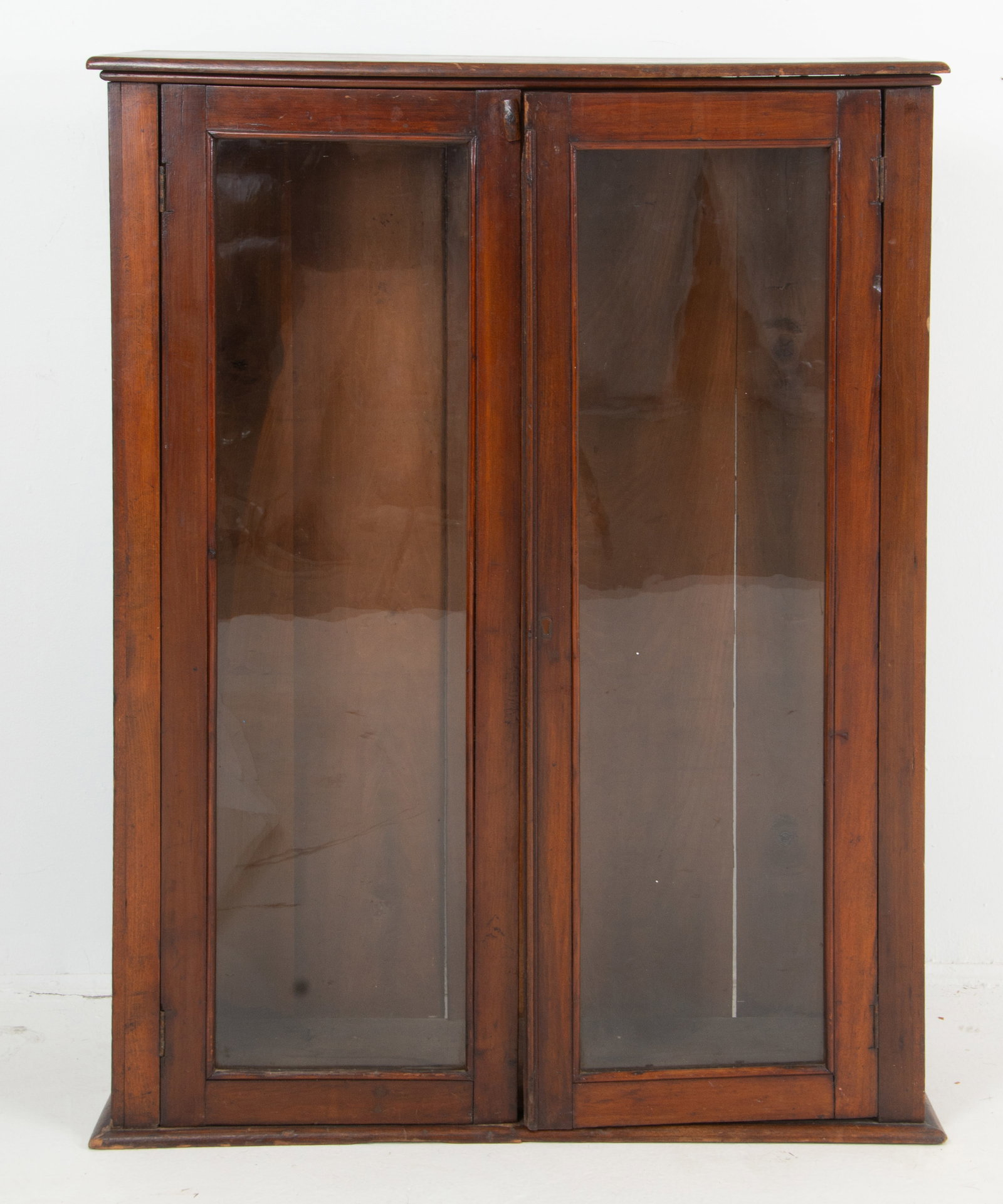 19th C. Walnut Table Top Cabinet: Glass doors open to interior with two adjustable shelves ; 29 1/4"W, 10 1/4"D, 37 3/4"H; good overall condition with scattered scratches and abrasions commensurate wih age and use---This lot does not 