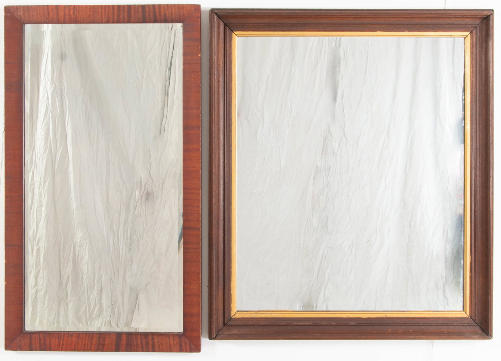 Two 19th Frames, Currently w/ Mirrors: Rectangular walnut frame with gilt fillet; sight approx. 29 1/2" x 24 1/2"; frame 35 1/2" x 30 1/2"; good overall condition---Rectangular figured mahogany frame with beveled mirror; sight approx. 33 1