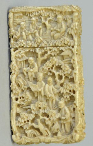 Chinese Carved Ivory Card Case: Late 19th century carved ivory card case with cover, rectangular form, relief carved decoration on all sides depicting figures in garden setting, one side with reserve inscribed "MFM to ECO"; 1 3/4"W,