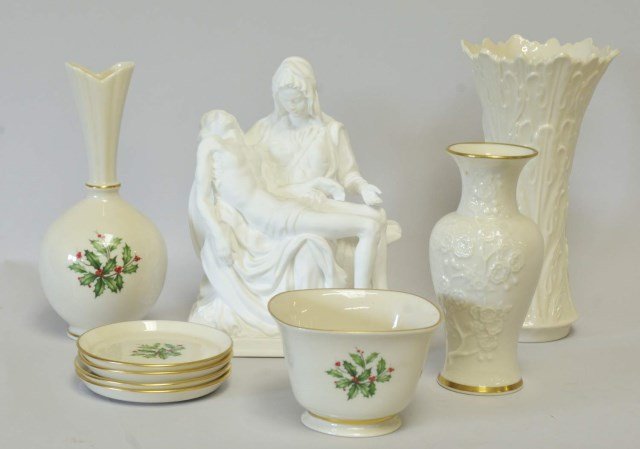 Lot of Lenox China Decorative & Tableware: Nine pieces: 1. Lenox sculpture "Pieta", marked "Limited Edition", 6 1/2" x 4 1/2", 8 3/4"H; 2. Christmas vase, 8"H; 3. Christmas bowl, 4 1/4" x 4 1/4", 3"H; 4. Four 4" Christmas coasters; 5. 8 1/2"H