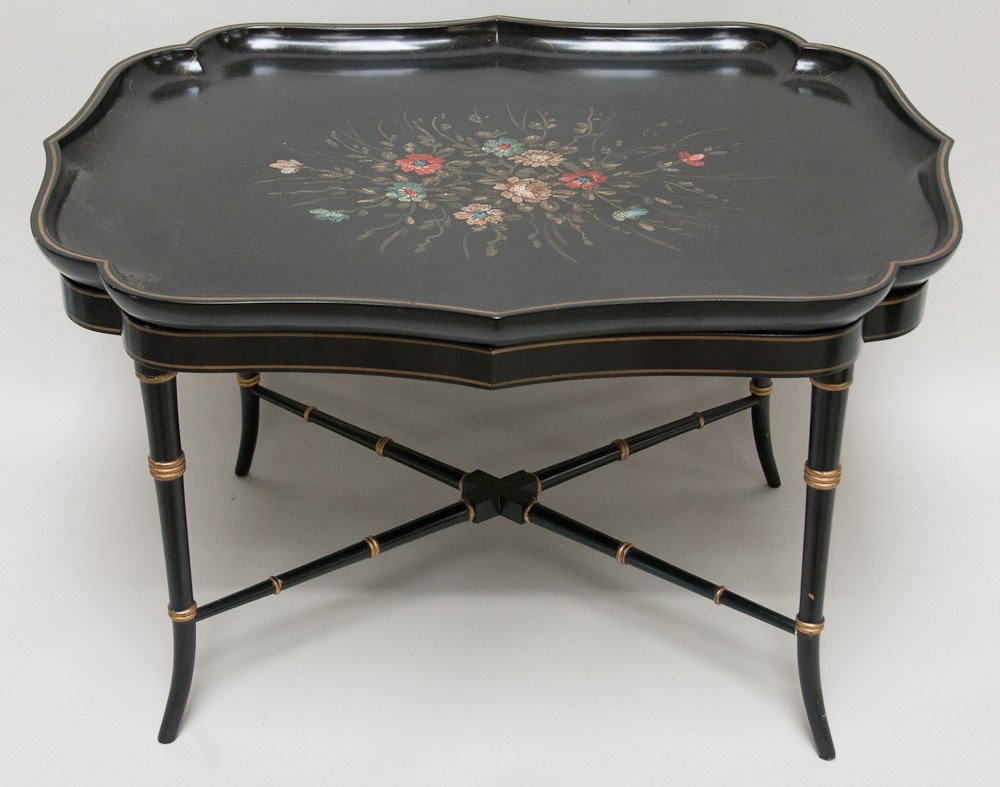 Hand Painted Black Tray Top Table: Black tray top table on parcel gilt faux bamboo base, shaped wooden tray with hand painted floral design to center and scrolled gilt border; 31 1/2"W, 25 3/4"D, 19 1/2"H; top with surface scratches