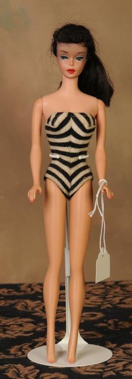 #4 Ponytail Barbie, c. 1960: Brunette ponytail with curly bangs, red polished nails, wearing black and white stripe swimsuit (Inv. 1-22)--From the collection of Jimmy Draper, Spartanburg, SC