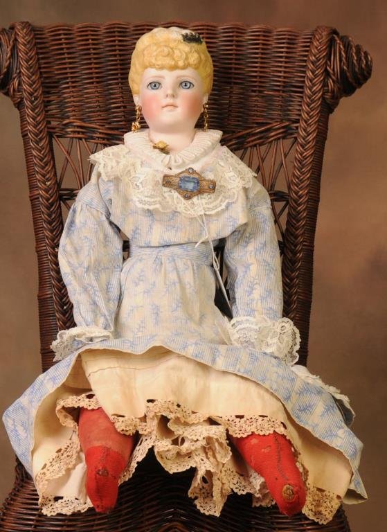 C. F. Cling German Parian Doll: Shoulder incised "144, 11", molded blond hair with hairclip, multi-stroked eyebrows, glass eyes with painted upper and lower eyelashes, wonderful old body with sewn on corset, 26"H (Inv. 6)--From the 