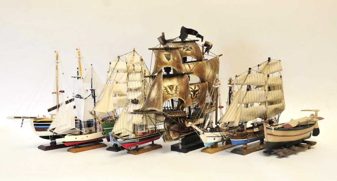9 Wooden Model Ships: Eight tall ships and one fishing boat; one ship named "Cutty Sark", one named "Ouragan 1830"; largest 19"H