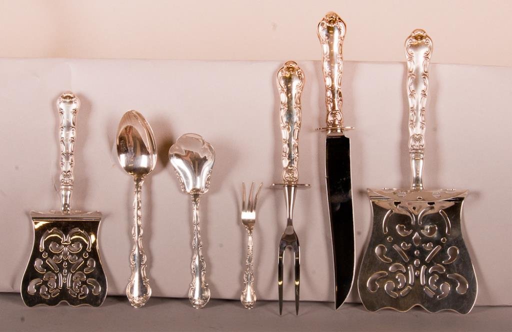 7 Pcs. Gorham Strasbourg Sterling Silver: 9 3/4"L hooded asparagus server with sterling silver handle; 7 1/4"L hooded tomato server with sterling silver handle; 4 3/8"L lemon fork; 6"L sugar shell spoon; 6 3/4"L soup spoon; two-piece steak ca