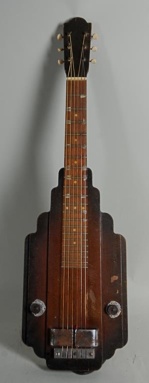 c. 1940s Lap Steel Guitar Likely a "house brand" guitar: Likely a "house brand" guitar built by Kay, Supro, National or Oahu (The electric lap steel was the link between the Hawaiian/Dobro guitars of the early 1900s-1930s to the better known pedal steel gui