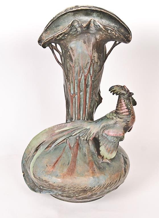 Large Amphora Pheasant Vase Tall Amphora woodland: Tall Amphora woodland pheasant vase, in green and brown, early 20th century, Amphora oval mark and 4104 to underside; 20 1/4"H, 11 1/2"W; small chip to pheasant's tail as it wraps under base, hairline