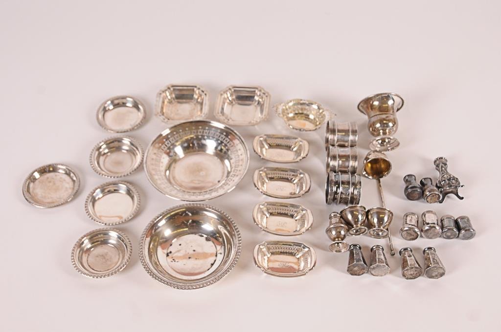 Lot of Sterling Silver 33 pieces: pair of Gorham: 33 pieces: pair of Gorham napkin rings, engraved with initial "M"; single napking ring with engraved decoration and monogram; 2 3/4"H Old Wallingford footed toothpick holder; 6 1/4" ladle; 5 3/4" pier