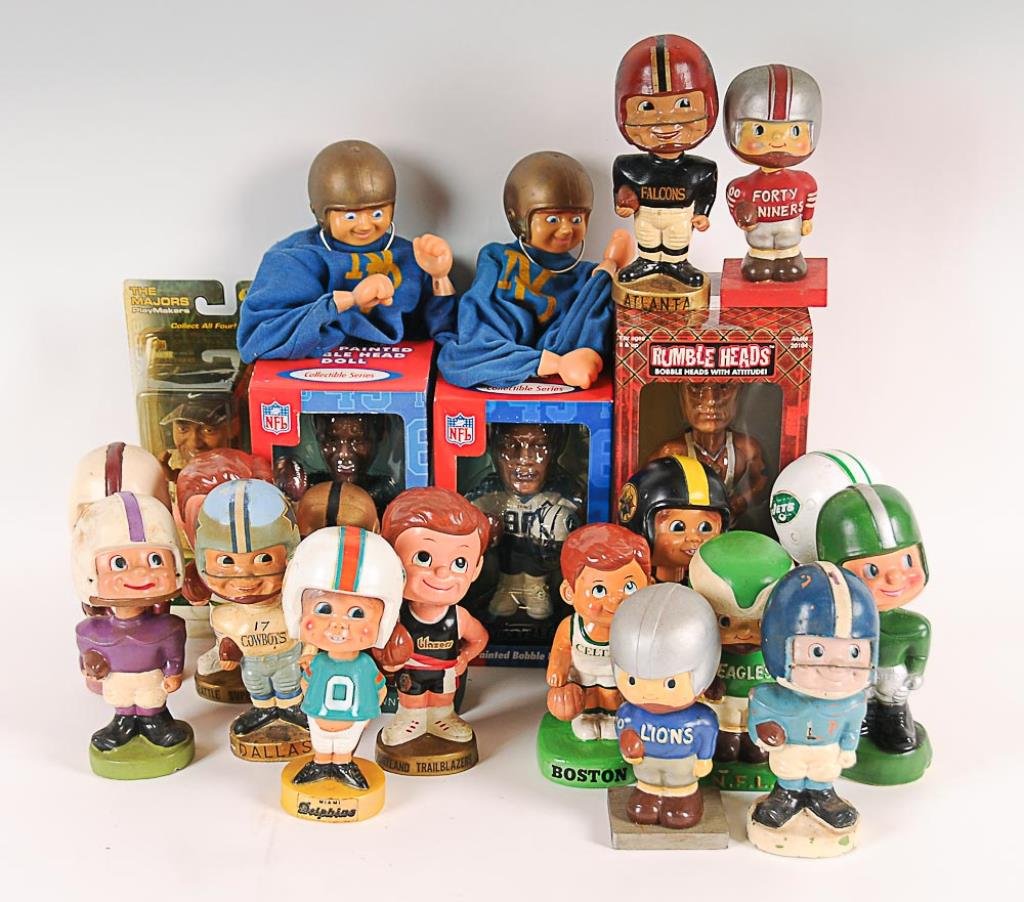22 Bobbleheads or Nodders--Mostly Football Assortment: Assortment of bobbleheads or nodders sports figures, many papier mache: comprising one football bank--twelve football players representing various teams: Forty Niners, Eagles, OU, Dallas Cowboys, New 