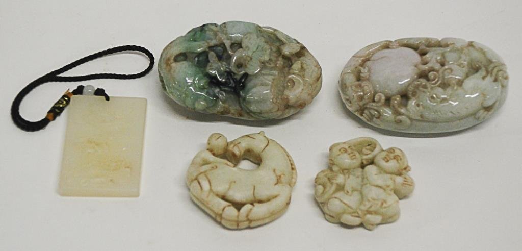5 Carved Jade Toggles or Pendants Comprising: 1st: Comprising: 1st item: Chinese carved white jade rectangular pendant plaque, crane and lotus blossoms to front, 1 1/2" x 2 1/4"--2nd item: Monkey riding on a horse with incised and infilled details, 2