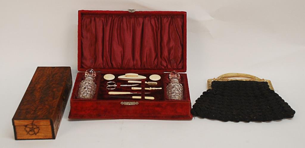 Lot of 3 Lady's Items 1st item: c. 1890 velvet box: 1st item: c. 1890 velvet box with necessaire set, comprising two pressed glass cologne bottles and celluloid implements (one broken), 12 1/2"W, 7 1/4"D, 3"H, wear to velvet--2nd item: Pine glove box w