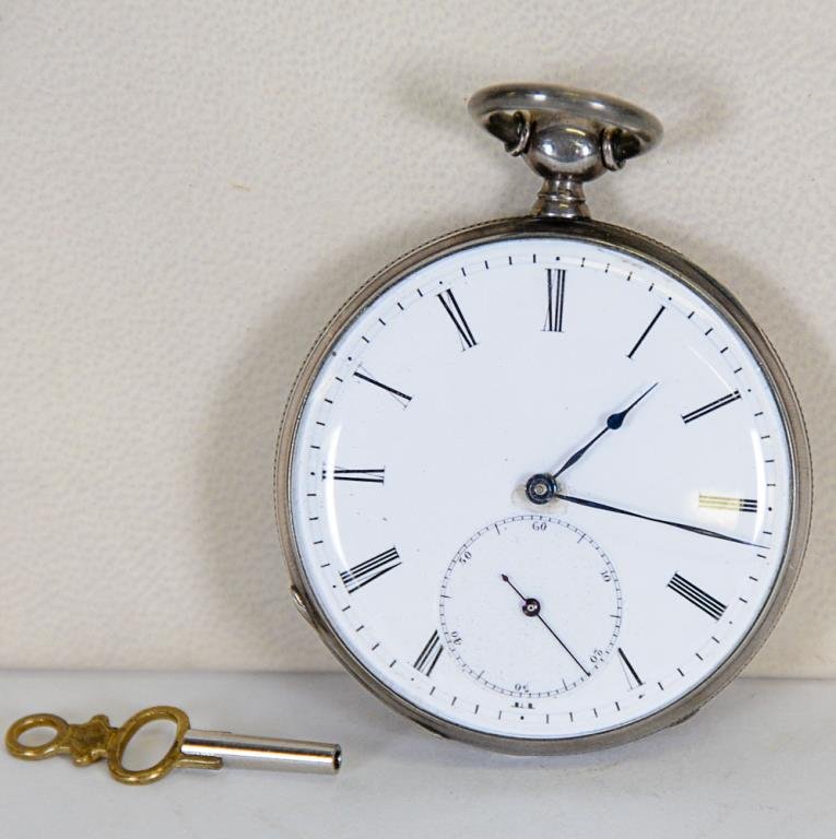 19th C. James E. Bonnet Key-Wind Pocket Watch: Men's silver metal, probably nickel, open face case; key-wind works (with key), cuvette marked "Detached Lever / James E. Bonnet / Neuchatel", 2 1/8" dia., in working order at time of cataloguing, sma