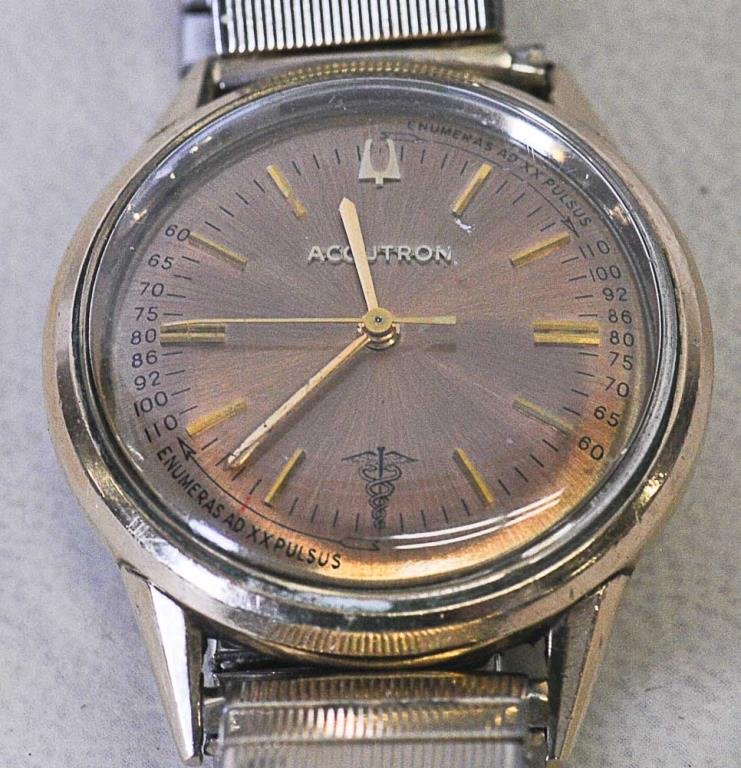 Bulova Accutron Doctor's Pulsation Dial: 1967 Bulova Accutron doctor's wristwatch, goldtone dial with pulsation scales on right and left and caduceus emblem at six o'clock, gold bar numeral markers, sweep seconds, marked "Accutron" and "Enum