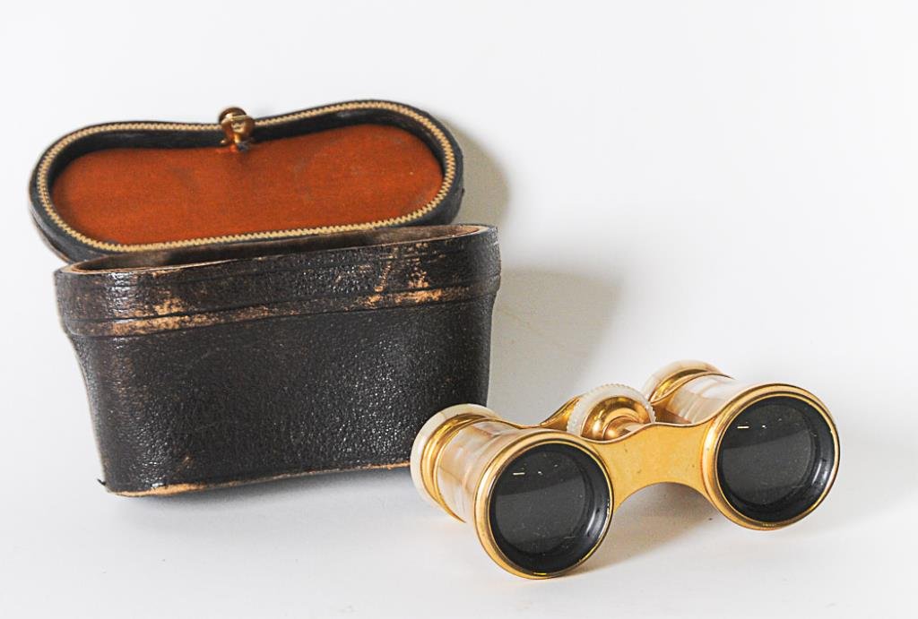 LeMaire Mother-of-Pearl Opera Glasses: One eyepiece marked "LeMaire Fab. Paris", other marked "Cady & Olmstead Jewelry Co / Kansas City Mo"; in original case; 3 7/8"W, 2 1/4"H (collapsed); good condition with minor signs of wear to case