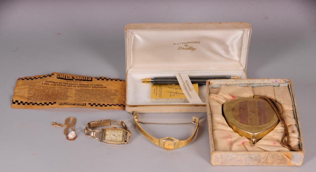 Vintage Wrist Compact, Ladies' Jewelry, Pen Set: Vintage compact with wrist chain in original box, gilt metal with incised decoration overall, hinged lid opens to mirror with rouge compartment, metal lipstick holder, and powder with puff; 2 3/4 x 2 