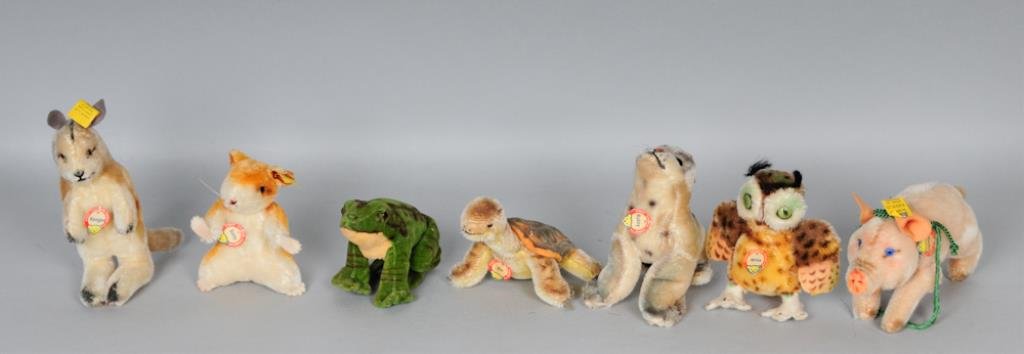 c. 1950s Steiff Miniature Toy Grouping: Seven miniature c. 1950s Steiff toys: "Slo" turtle, with paper name tag and ear button, height 3 1/4 in., length 5 1/4 in.----"Kangoo" kangaroo No. 4314; with paper name tag, ear button and ribbon; he
