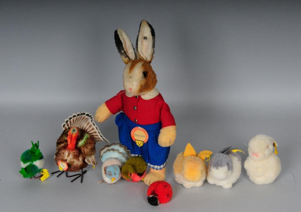 c. 1950s Steiff Toy Grouping--Hansili Rabbit, Etc.: Nine c. 1950s Steiff toys: "Hansili" rabbit, with paper name tag and ear button, height 10 3/4 in.----"Tucky" turkey No. 1310; with paper name tag, ear button and ribbon; height 4 1/4 in.----Three woo
