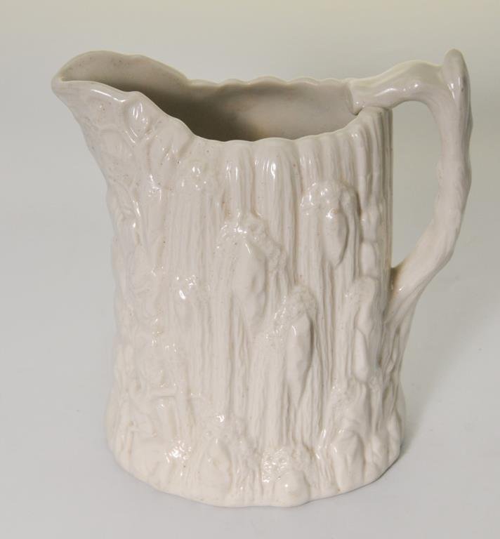 Bennington U.S.P. "Cascade" Parian Pitcher: United States Pottery Company, Bennington, Vermont; c. 1852-1858; highly glazed white porcelain pitcher in the Cascade pattern, base marked with raised U.S.P. lozenge mark G, 8 1/2"H; "Y" shaped crack