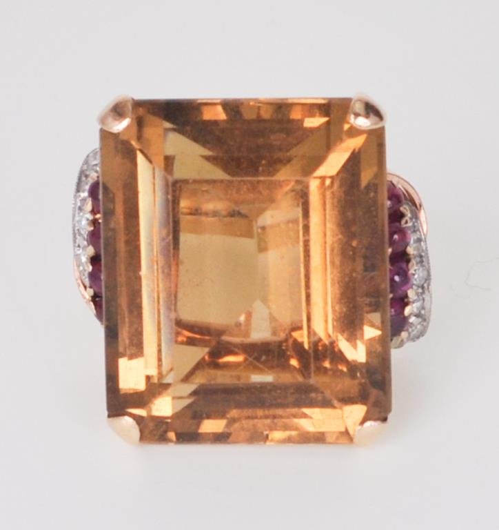 Vintage 14kt Gold Citrine, Ruby & Diamond Ring: Vintage retro 14kt yellow gold ring set with one approx. 37ct citrine, accented with eight cabochon cut rubies and ten single cut diamonds 1.5-2mm in size; size 5; gold weight approx. 10 grams; total