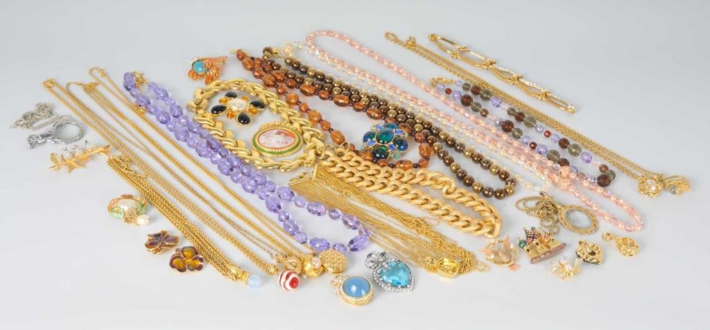 Lot of Joan Rivers Brooches, Necklaces, Pendants: 35 pieces including ----Thirteen brooches designed as: four birds sitting on a branch, hummingbird, Russian palace, bird on round perch, (2) pansy, cameo, Caribbean ocean blue maltese cross, heart-sha