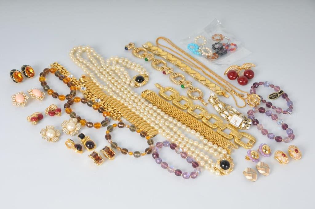 Lot of Joan Rivers Earrings, Bracelets, Necklaces: 35 pieces including: One three-piece jewelry suite with brooch and earrings designed as cherries on stems with rhinestone accented leaves----One three-piece jewelry suite with necklace having a locket