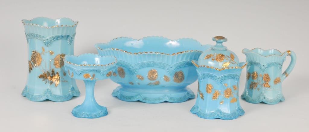 5 Pcs. Chrysanthemum Sprig / Pagoda: Northwood Glass Co., c. 1899; opaque blue with blue staining and gilt decoration; five pieces comprising: Master berry bowl; 10 5/8" x 7 3/4", 4 3/4"H; good condition----Celery vase, 6 3/4"H, a few sm