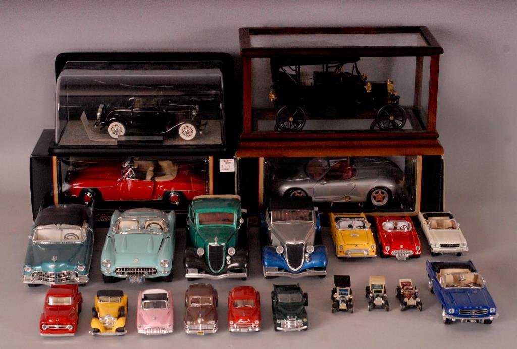 21 Diecast Model Cars--Franklin Mint, Solido, Etc.: 1932 Ford Deuce Coupe, Franklin Mint, in display case--1913 Model T, Franklin Mint, wood and glass display case--1936 Ford V-8 Pick Up, 1955 Cadillac Eldorado, Ford V-8 Roadster, 1946 Chrysler Windsor