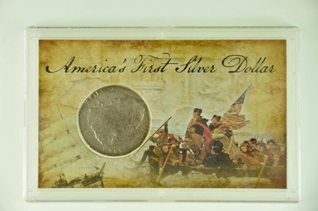 "America's First Silver Dollar"---1783, 8 Reales: Dated 1783, 8 Reales silver dollar (aka Portrait Dollar), discovered in remains of a Spanish brig of war off coast of Louisiana; on display card stating "Eight Reales were the preferred form of curren