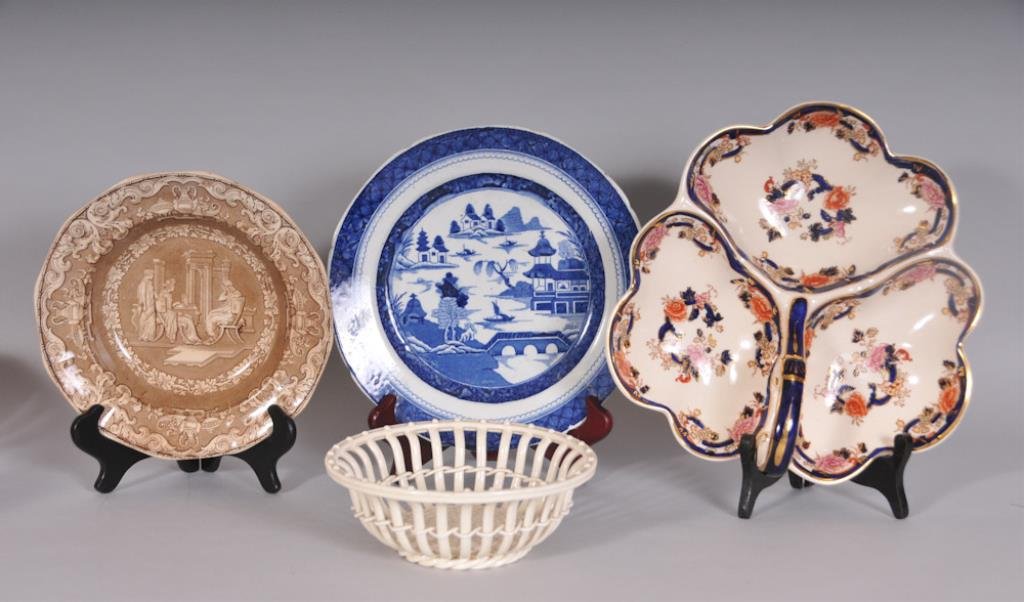Four 19th Century English Serving Pieces: Early 19th century English round creamware twig basket with basketweave base and spiral molded interlaced sides, base impressed "LO" and "843", 7" dia., 2 1/2"H; very good condition overall with flea