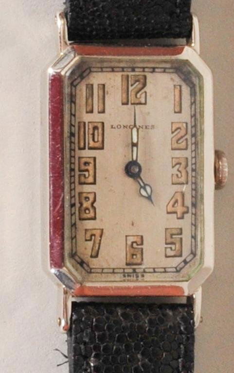 Longines Gentleman's Wristwatch: 15 jewels, 14kt gold filled case, leather band, in working condition at time of cataloguing but not guaranteed (Ref. 1)