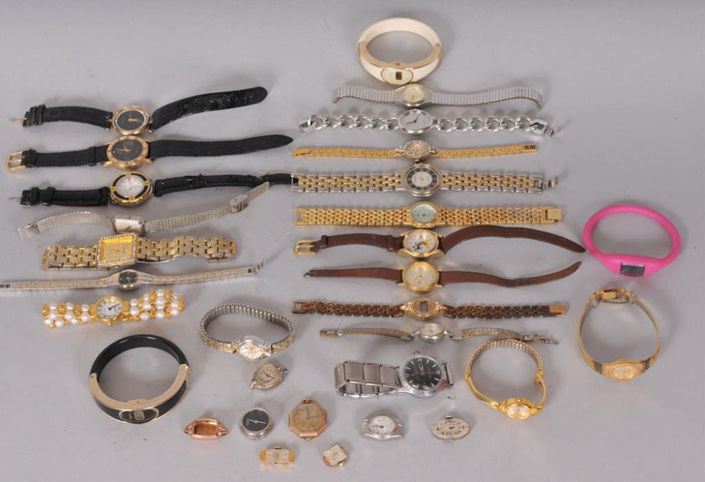 Grouping of 27 Watches, Etc.: Lot of 27 watches, three movements and one case: Watches include Wadsworth, Croton diamond quartz, Pulsar quartz, V-Mac, Gruen pendant watch, two Mickey Mouse, Embassy by Gruen, Waltham 17 jewel, amon