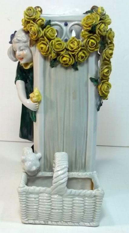 Amphora Vase c1910: Girl with basket and chick. Marked Austria Amphora. Some loss on flowers. Measures approx. 9.5" tall.