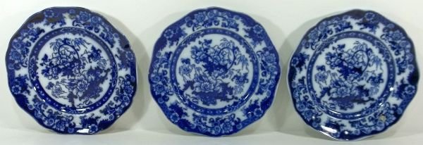3-Flow Blue Staffordshire Plates: J. Ridgeway Cauldon England, "Bentick." c1890. One plate has two small flakes. Measures approx. 10." diameter. Please Note: This one owner Flow Blue collection is generally in very good condition. How