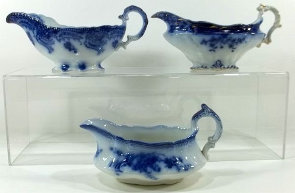 3-Flow Blue Staffordshire Sauce Boats: (1) "Ashbuton", (1) "Marechal Neil" and (1) unidentified. Measures approx. 4" tall. Please Note: This one owner Flow Blue collection is generally in very good condition. However you must expect the im