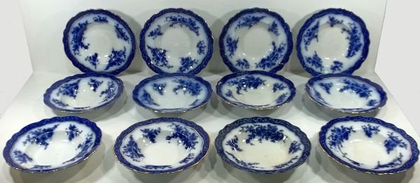 12-Flow Blue Staffordshire Soup Bowls: c1900. (1)Stanley Pottery Co. (hairline) and (11) Henry Alcock. England, "Touraine." Crazing some dark. Measures approx. 8.75" diameter. Please Note: This one owner Flow Blue collection is generally i