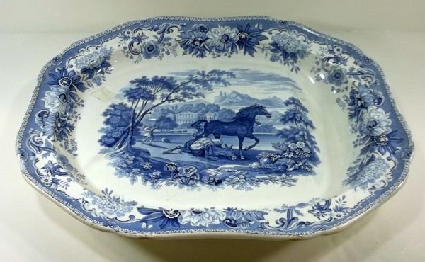 Blue Transferware Spode Meat Platter: Spode. Aesop's Fables. " The Horse and the Loaded Ass". c1830. One large chip on raised foot. Measures approx. 20.75" x 16". Please Note: This one owner Flow Blue collection is generally in very good