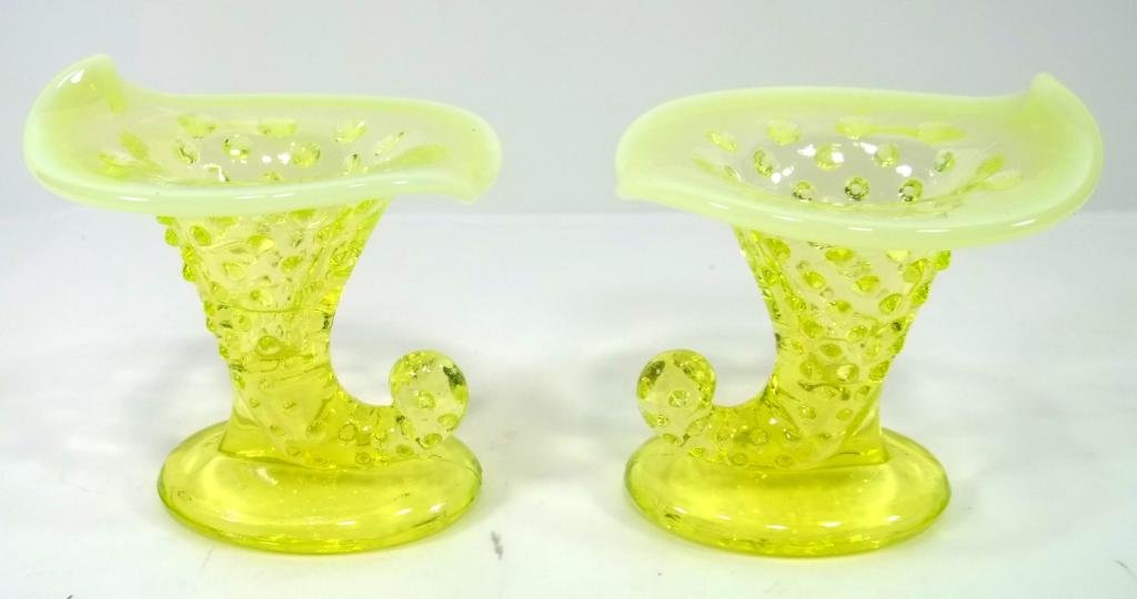 Pr. Fenton Vaseline Opalescent Hobnail Cornucopias: Measures approx. 3.75" tall. This piece comes directly from a collector whose great uncle worked at Fenton during the first half of the 20th century.