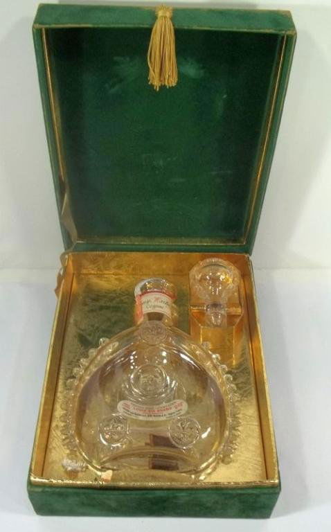 Baccarat Crystal Bottle: Louis XIII Cognac bottle (empty) by Remy Martin & Co. In original box. Measures approx. 11" tall with stopper.