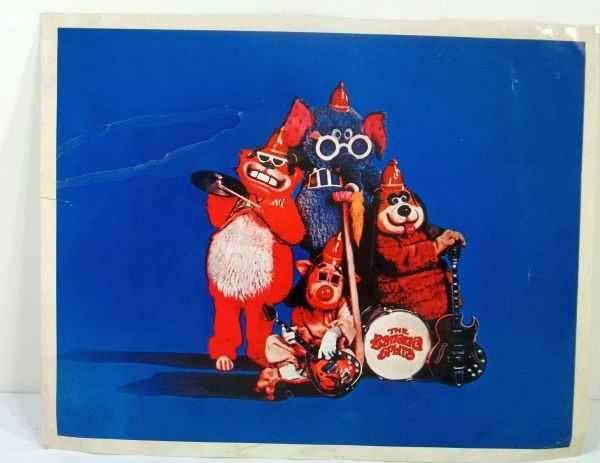 Banana Splits Autograph: Publicity color 8x10 photo with autographs on reverse. The Banana Splits are four funny animal characters who featured in a late 1960s children's variety show made for television. The costumed hosts o