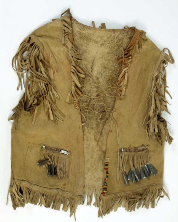 Buckskin fringed vest, back in hand painted: Buckskin fringed vest, back in hand painted with eagle motif front further decorated with tin cone dangles and light beadwork.