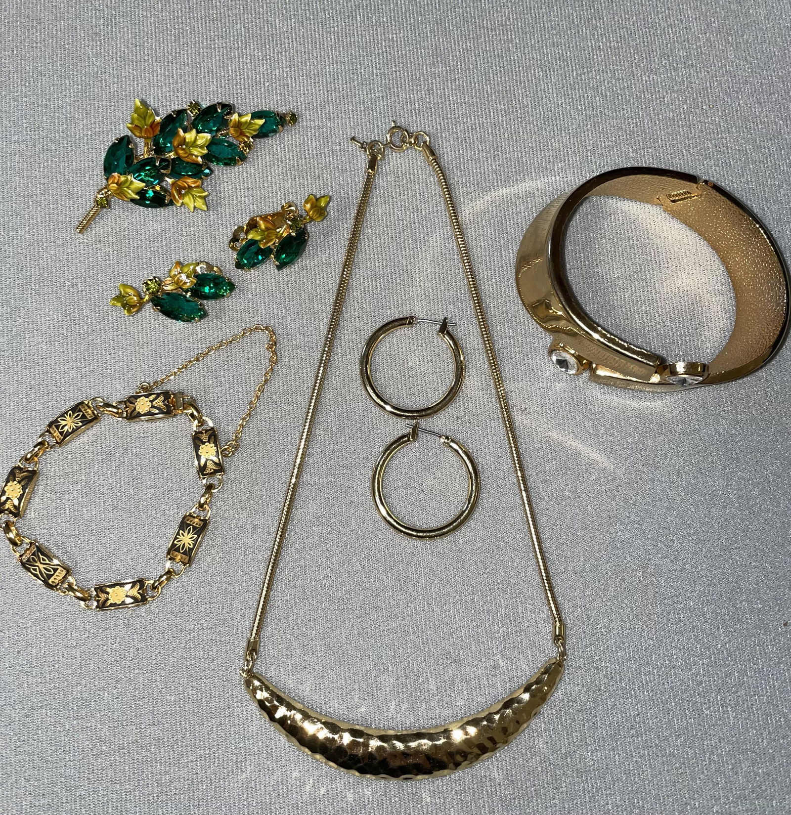 Costume Jewelry Lot, Trifari: Trifari Gold Necklace, Hoops, 2 bracelets, and pin