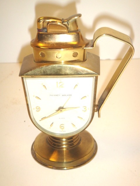 Phinney-Walker Swiss Lighter & Alarm Clock: Swiis made brass table lighter and alram clock. Approx 6" tall the lighter and clock does work, although the alarm needs some attention.
