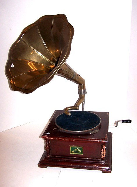 RCA Phonograph With Brass Horn: Late 20th century RCA phonograph with 16" flared brass horn. Distresses to age. Condition is good.