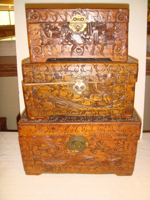 Set of 3 Carved Lidded Boxes: Very ornate and highly carved set of three lidded boxes. Late 20th century decorative boxes.