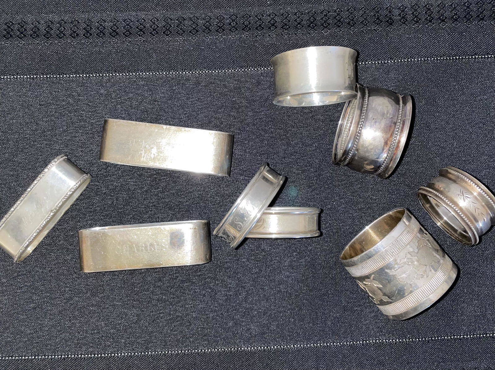 Sterling Napkin Holders: Various sterling napkin holders, 2 not marked, 'charles' 'margaret' on 3 of them, 2 gorham