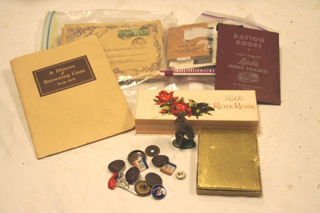World War II Buttons, Maps and More: With WWII era papers, ration books, pins, buttons wallets and much more. Nice Military lot.
