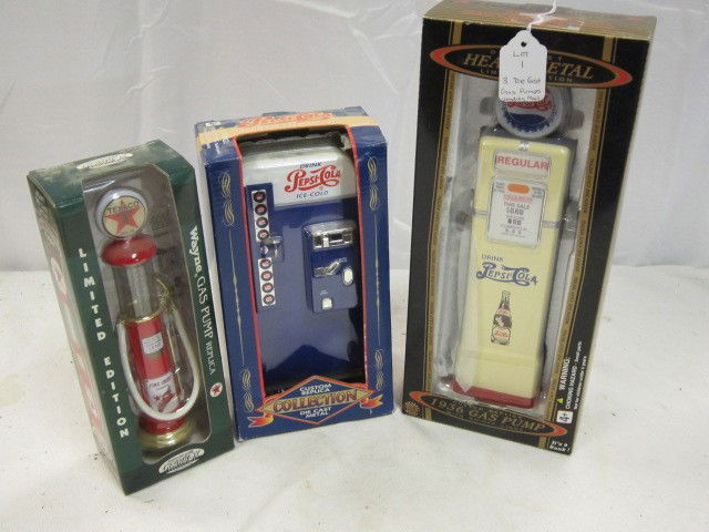 3 Recent Vintage Die Cast Adverting Pcs: Including 2 gas pumps and a Pepsi vending machine in the original packages. Very neat pcs