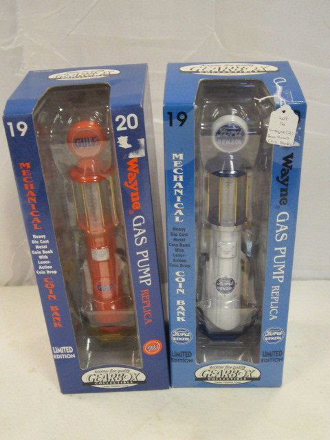 2 Wayne Gas Pump Collectible Die Cast Banks: Coin Banks of old gas station pumps, both by Wayne and replicas in they're originals packages.