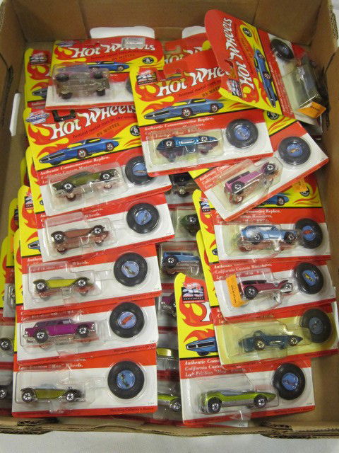 26-1990's t Vintage Red Line Hotwheels: Over 30 hotwheels replica red line cars in the packages.