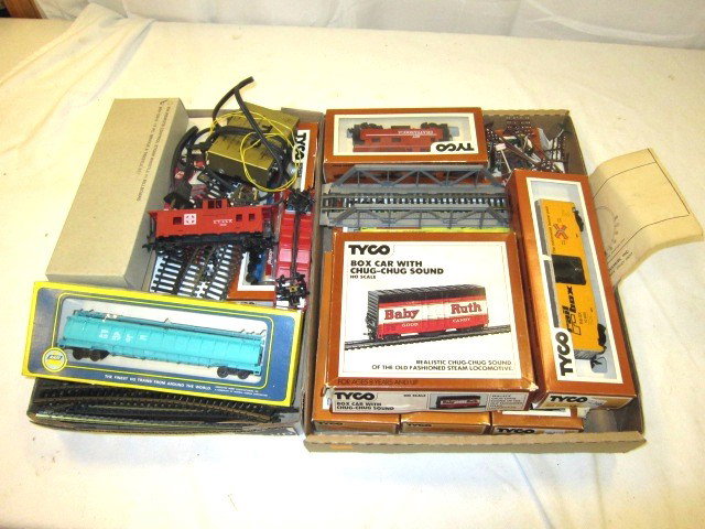 Tyco Train Lot: including track, power supply, box cars, cars, layout pieces and more. Nice lot of Ho gauge.